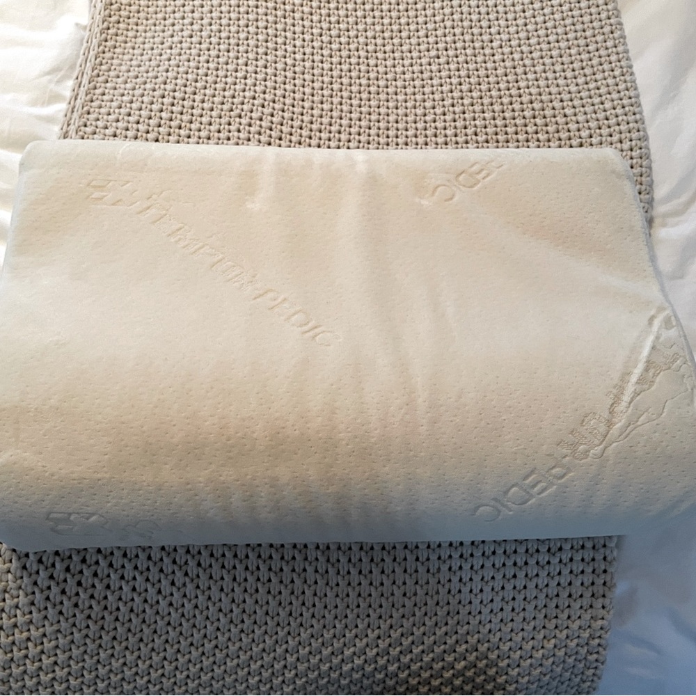 Tempur-Neck pillow for side and back sleepers.